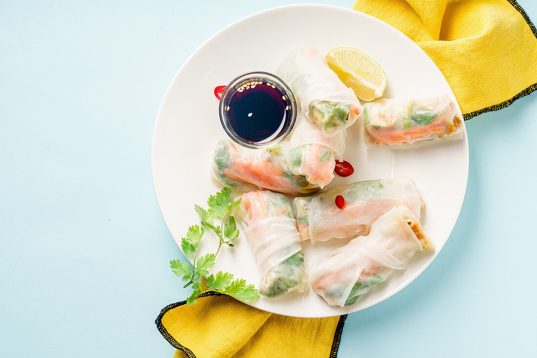 Vegan spring rolls with tofu, marinated carrot and daikon