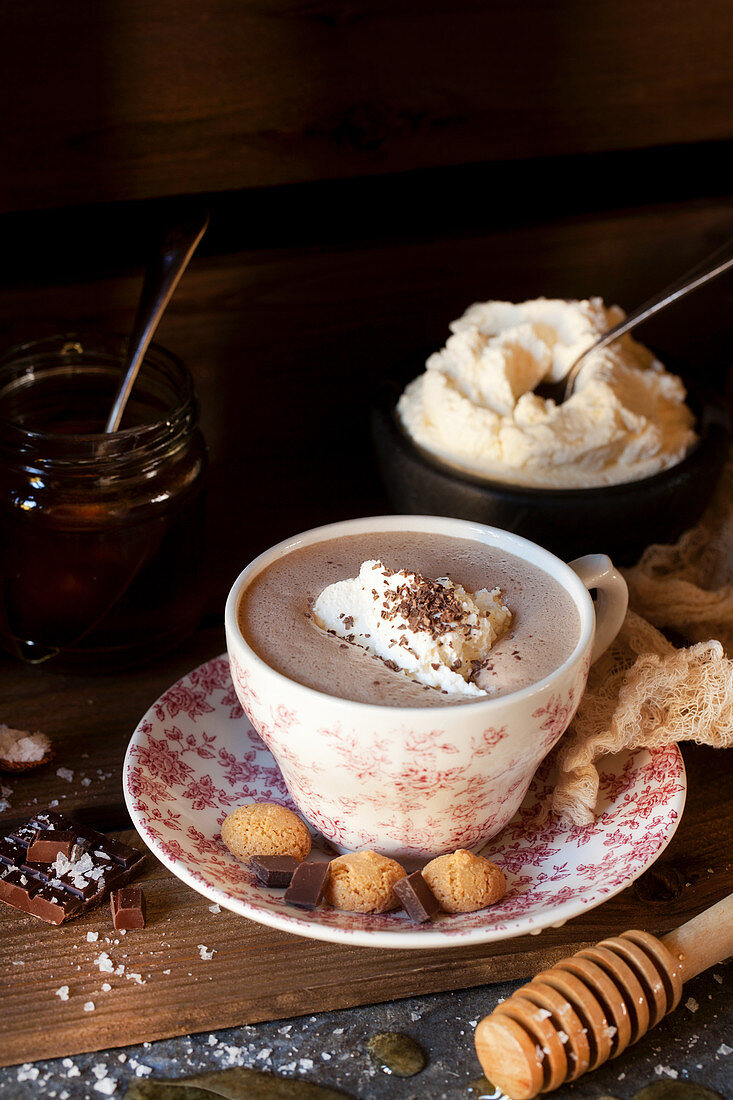 Hot chocolate topped with salted honey and whipped cream