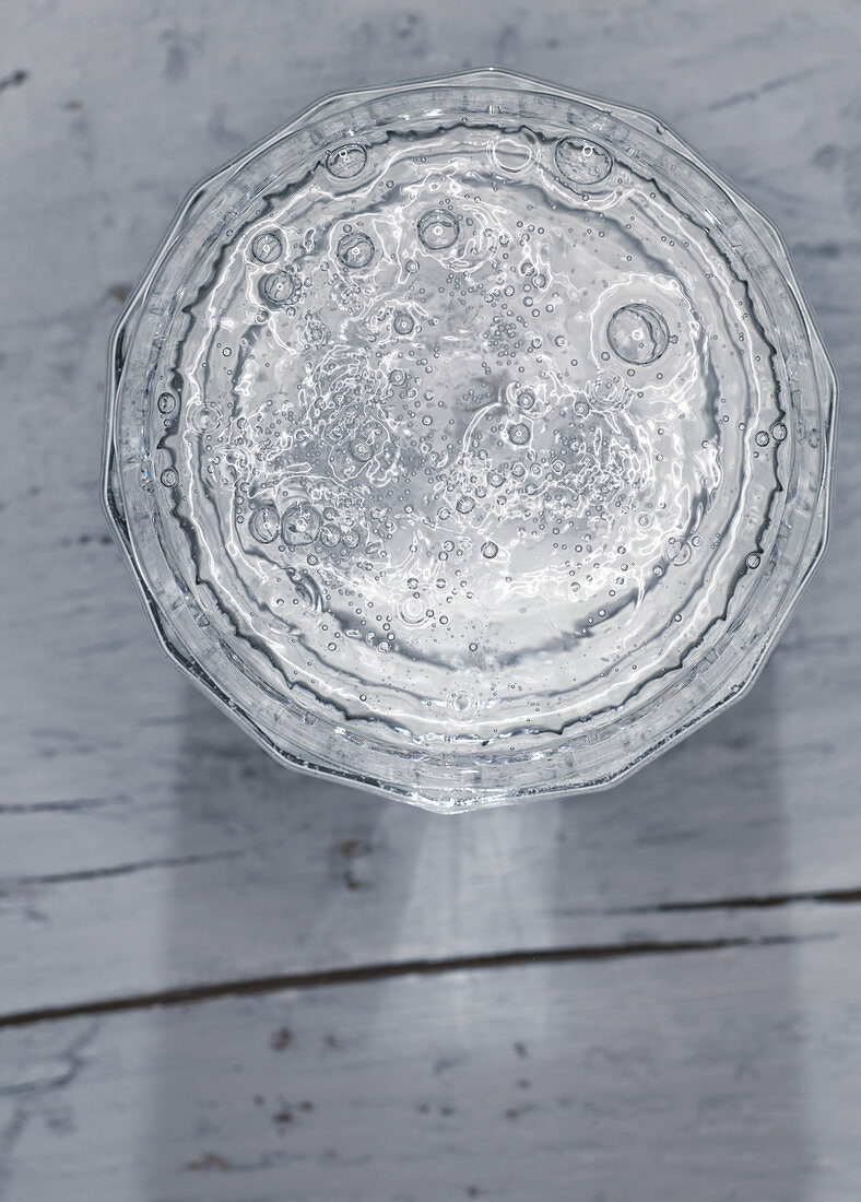 A glass of sparkling water (top view)