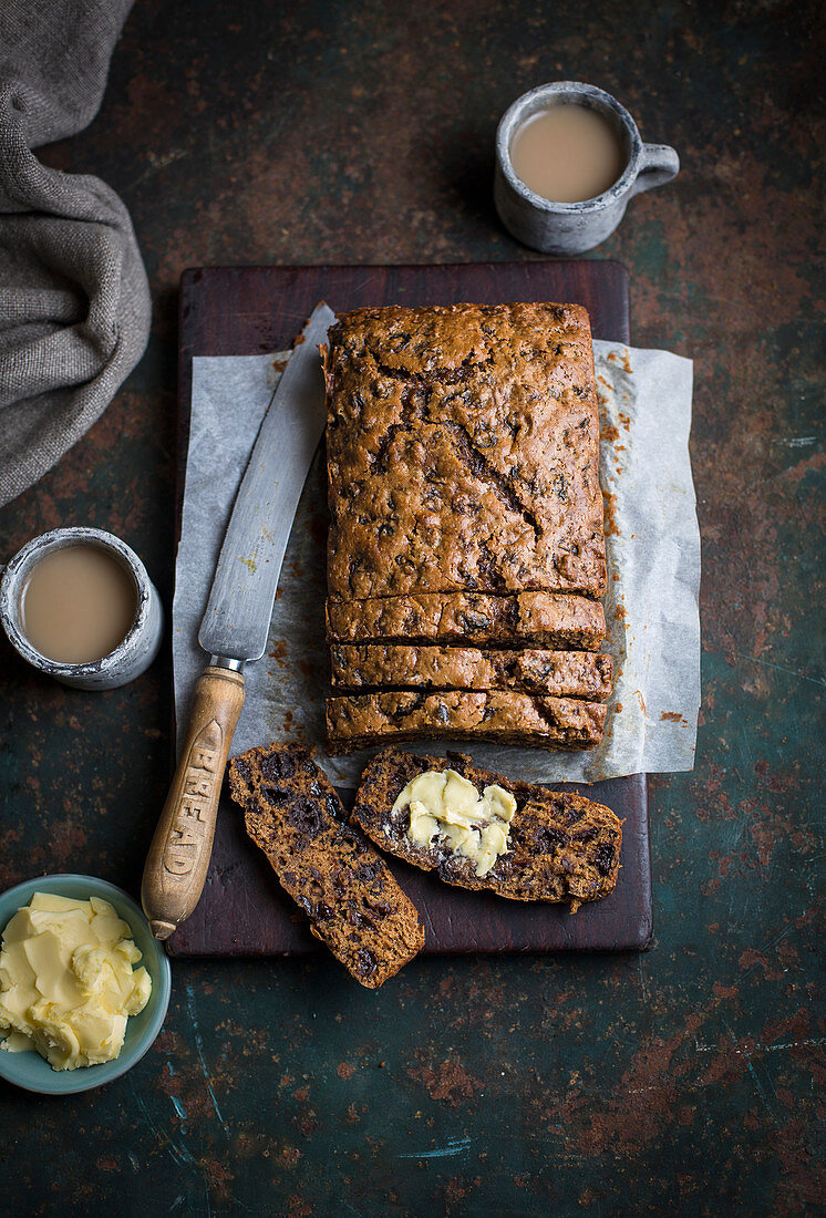 Sliced fruit bread with butter (top view)