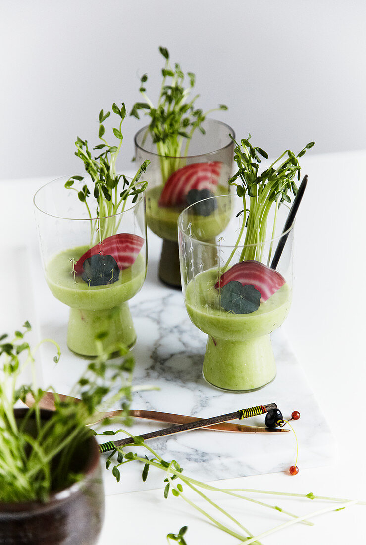 Avocado and apple drink with beetroot and cress