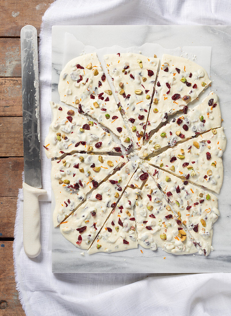Broken white chocolate with dried fruit and pistachio nuts