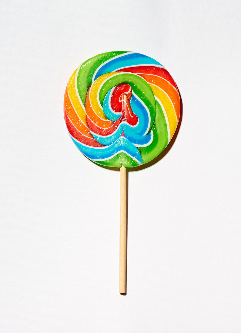 A colourful lolly on a white surface