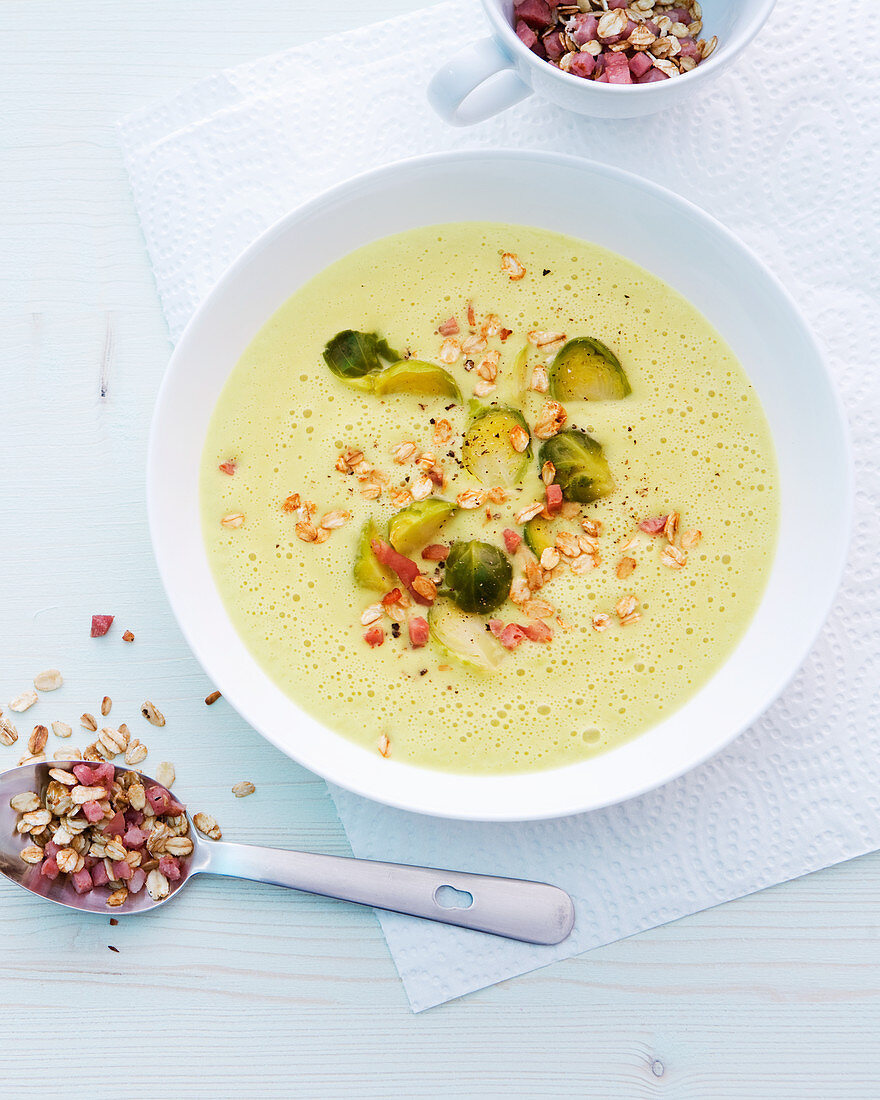 Brussels sprouts and parsnip soup with diced ham and oats