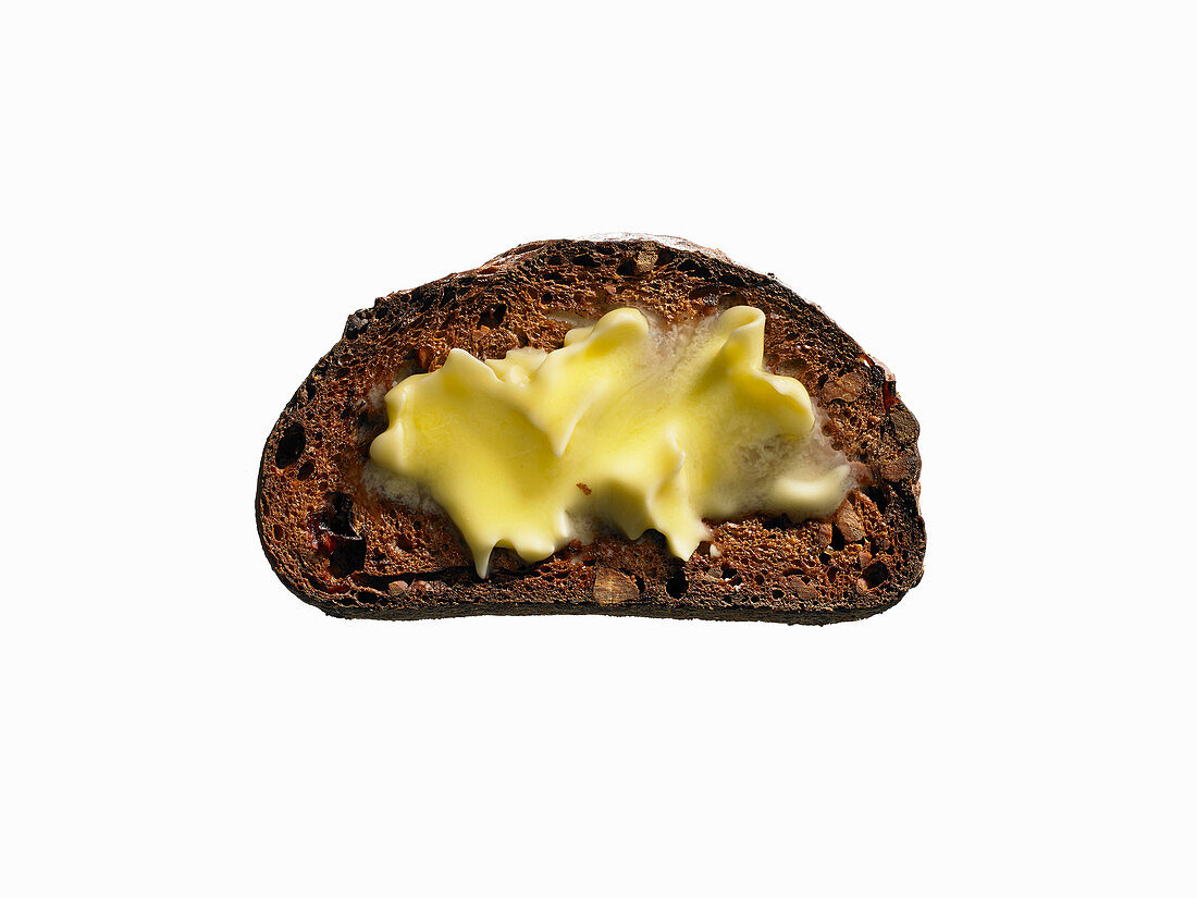 Nuss-Trockenfrüchte-Ciabatta-Toast mit Butter