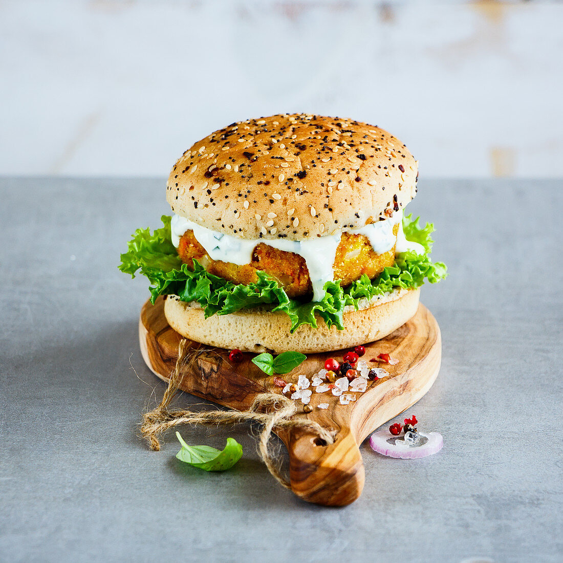 Healthy homemade vegan carrot and oats burger, wholegrain buns
