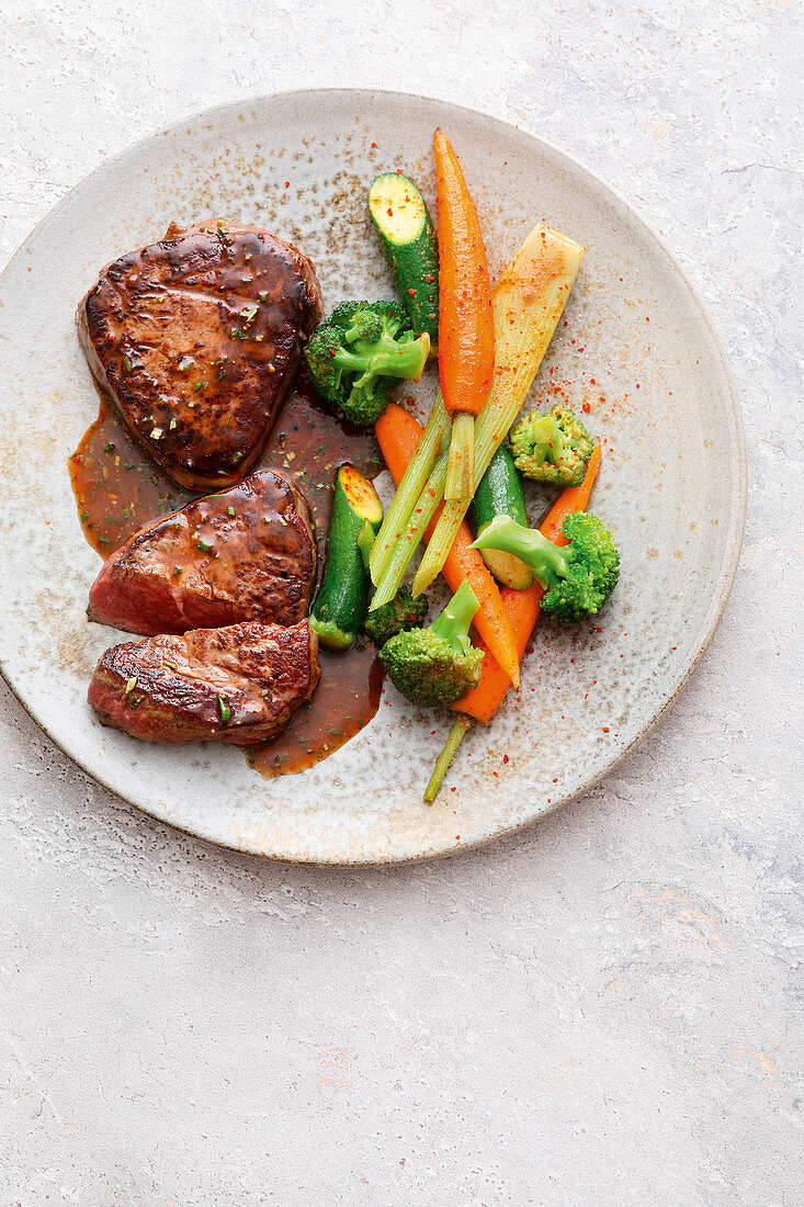 Italian style beef fillets with steamed vegetables