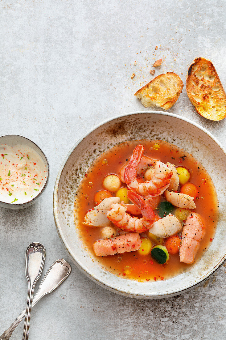 Bavarian bouillabaisse with shrimps, zander and char