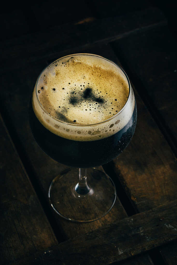 A glass of dark beer