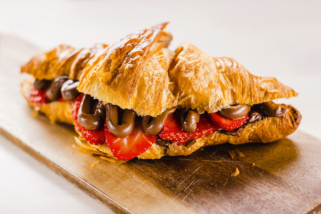 Croissant with chocolate and strawberry