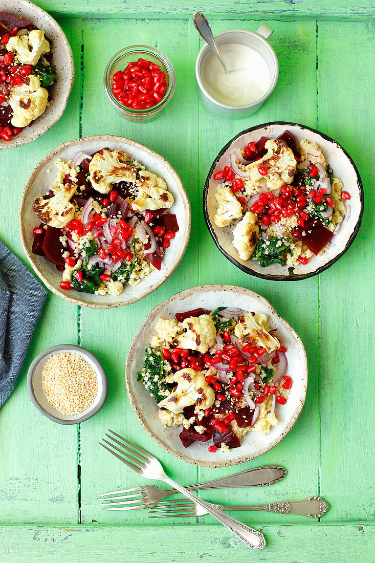 Couscous, beetroot and spinach salad with roasted cauliflower