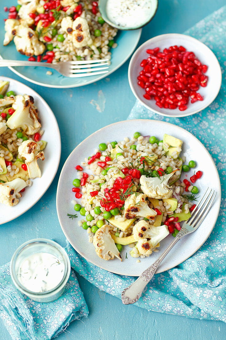 Barley and avo salad with roasted cauliflower and pomegranate