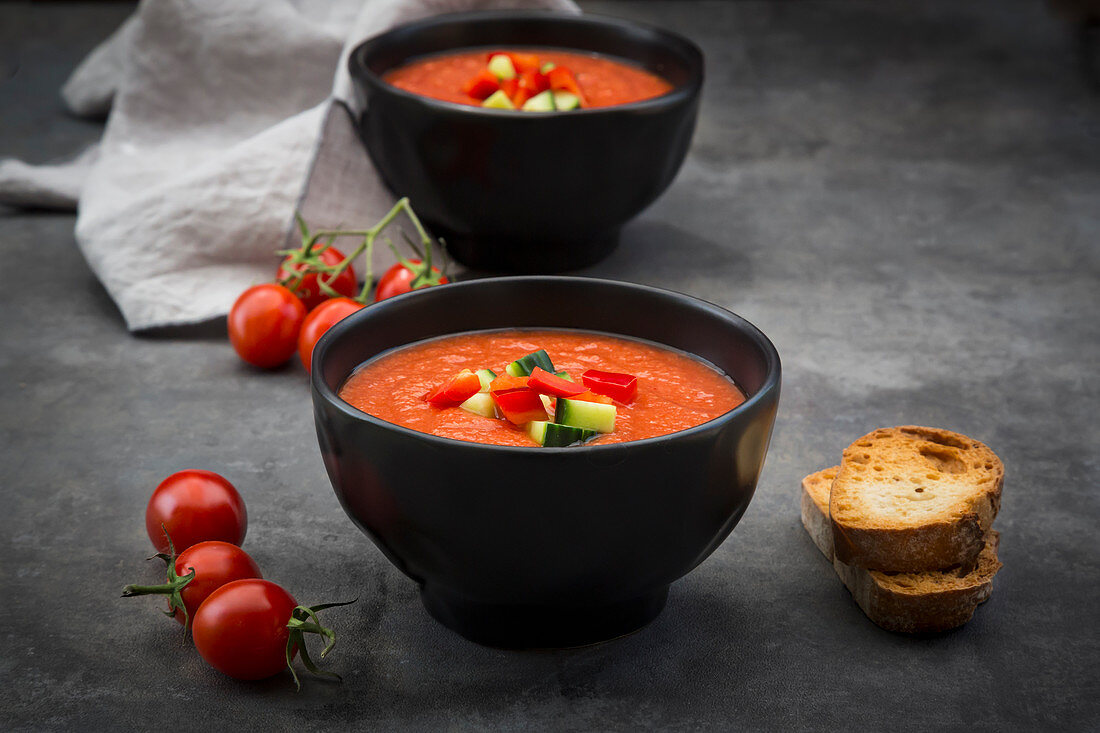 Gazpacho garnished with cucumbers and peppers