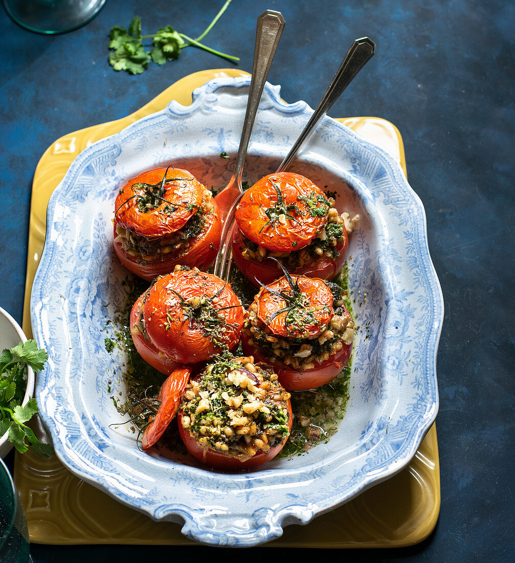Stuffed tomatoes with pearl barley and parsely pesto