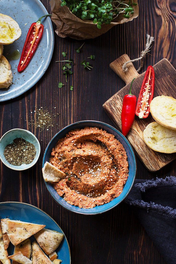 Roasted pepper and walnut spread and pita bread