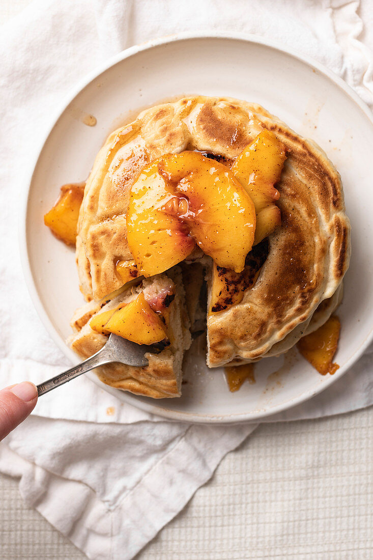 Pancakes with peach and maple