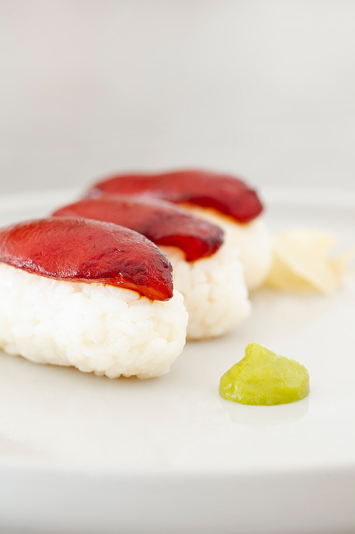 Vegan nigiri sushi with marinated soy tomatoes