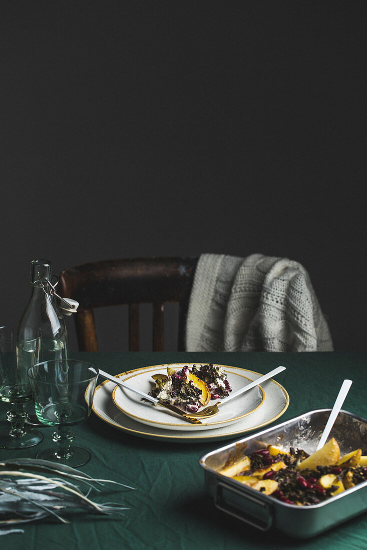 Potato, spinach and red bean bake on a table