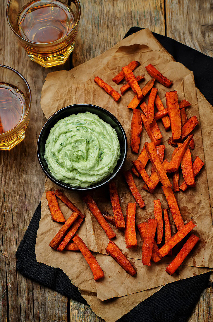 Avocado and greek yogurt dip wiht lime and cilantro, served with Sweet Potato Fries