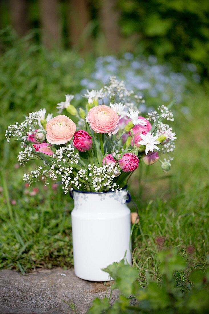Spring Bouquet With Ranunculus, Tulips, Carnations And Gypsophila
