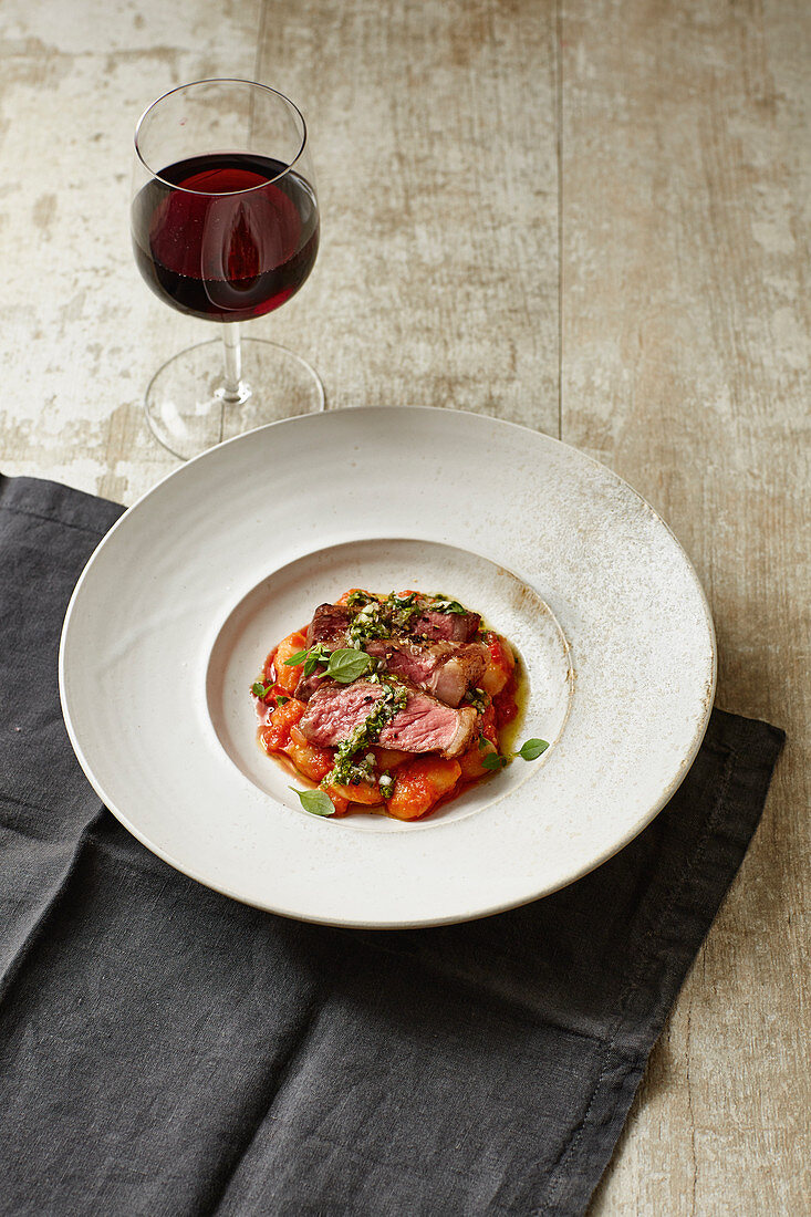 Grilled chimichurri steak with cannellini beans