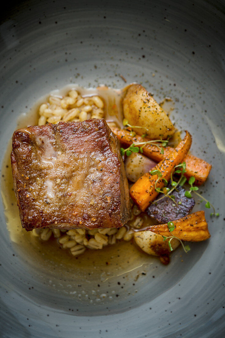 Braised Shoulder of Lamb with Spiced Pearl Barley and Vegetables