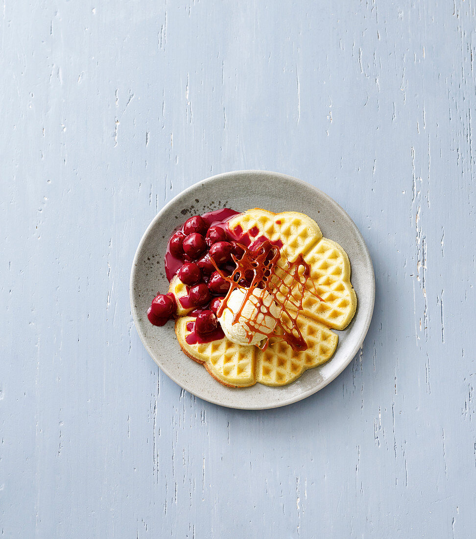 Classic waffles with cherries and caramel