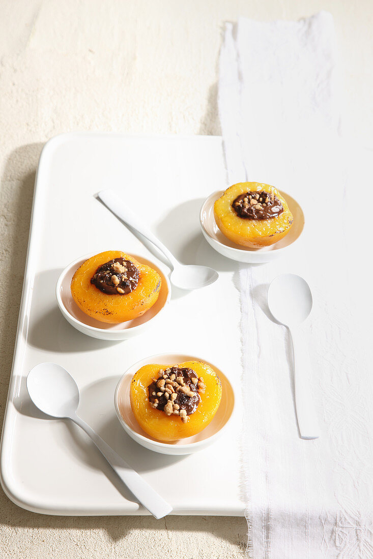 Peach filled with dark chocolate and nuts