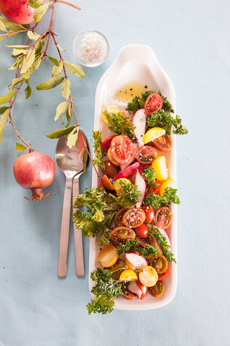 Vegetable salad with pomegranates and kale