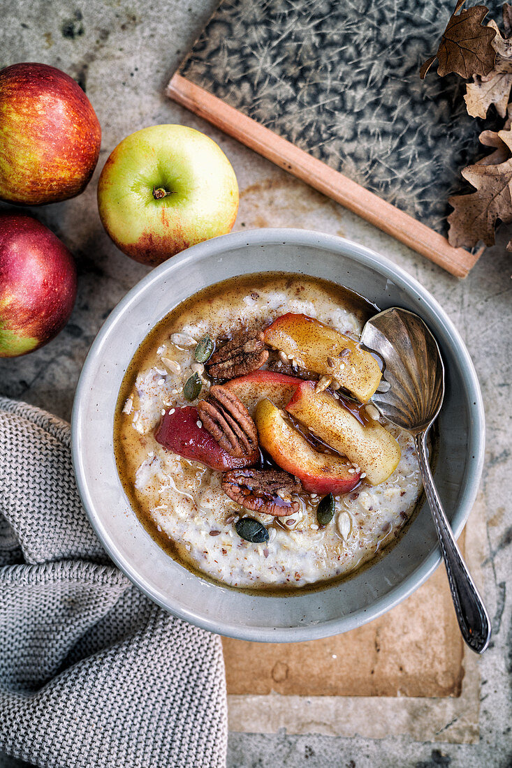 Autumn porridge with maple syrup and apples