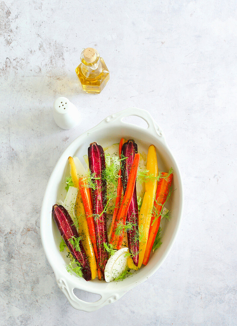 Pan of fennel and colored carrots ready for the oven