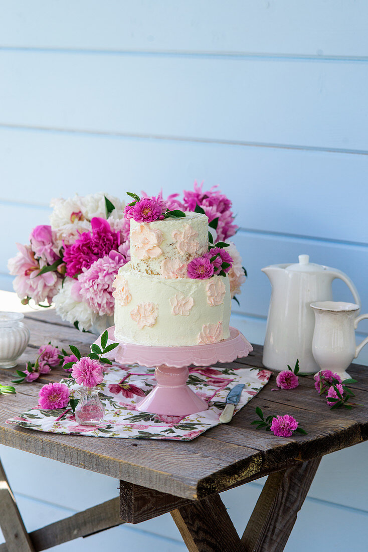 Buttercream with flowers on a terrace