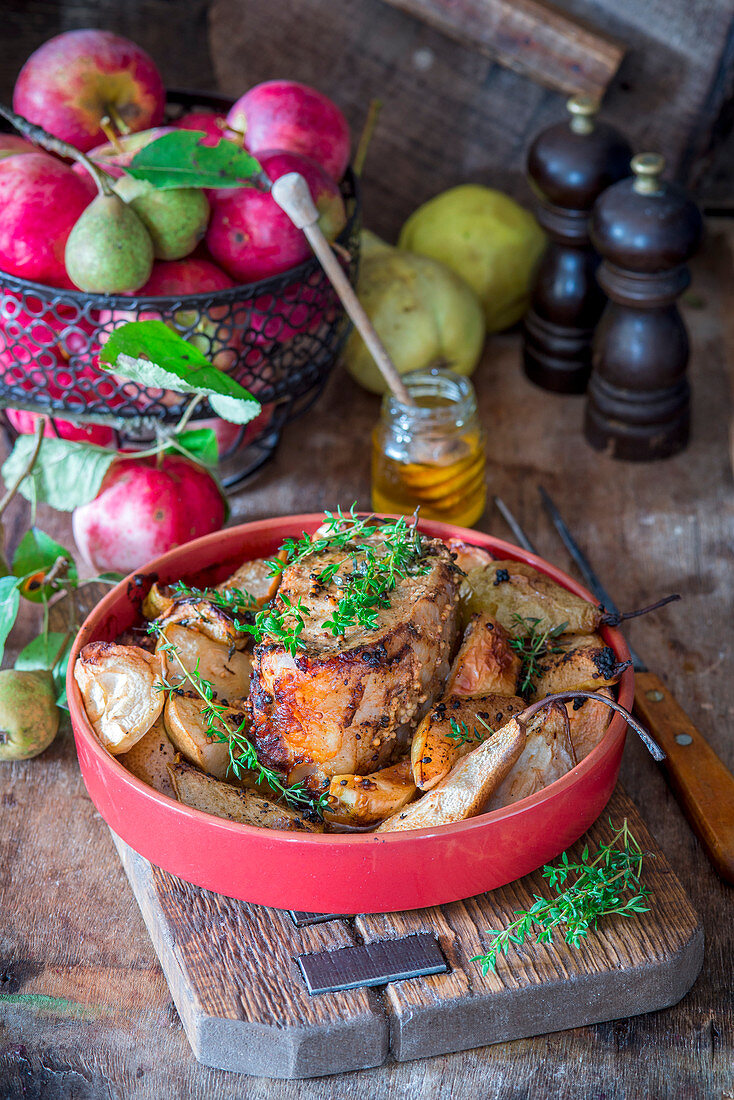 Roast pork with apples, pears, honey and thyme