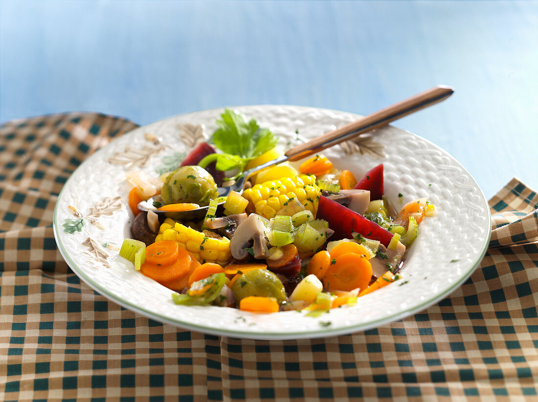 Vegetable stew with corn on the cob