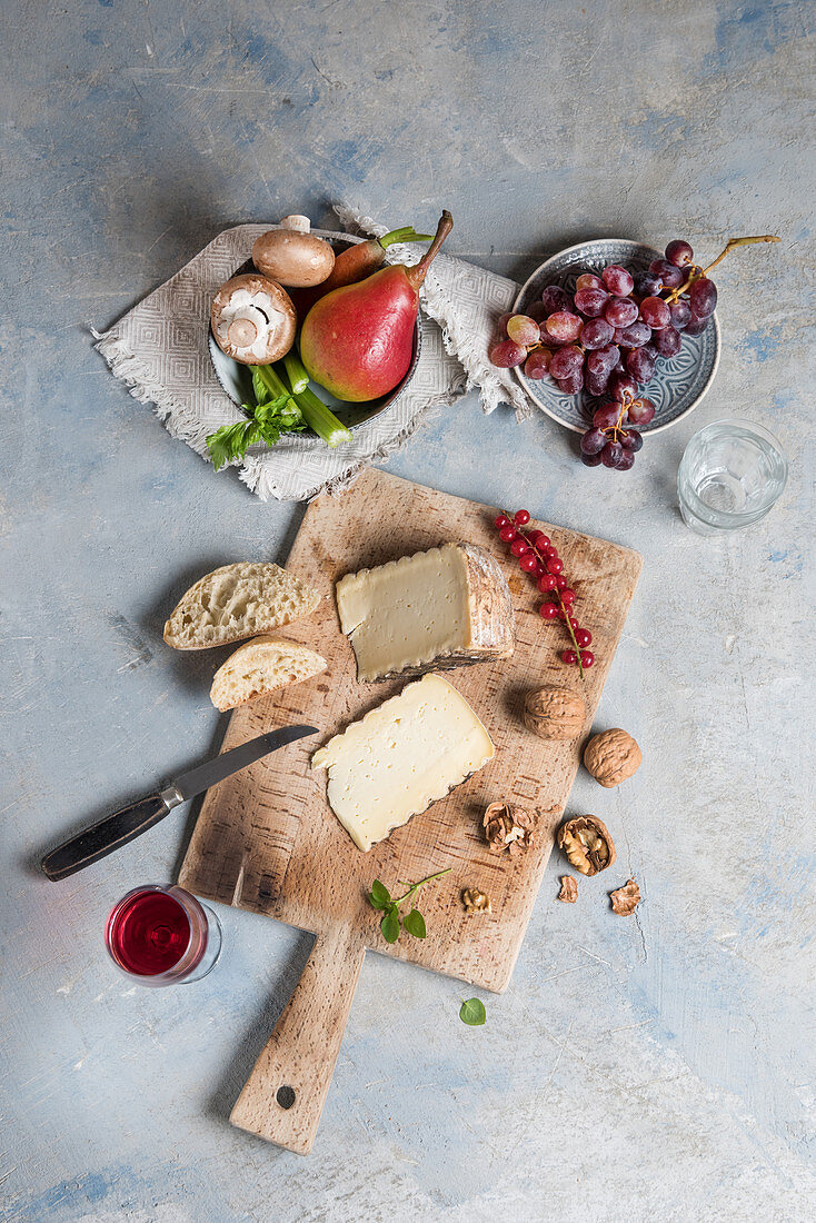 Tomme de Montagne with walnuts and redcurrants