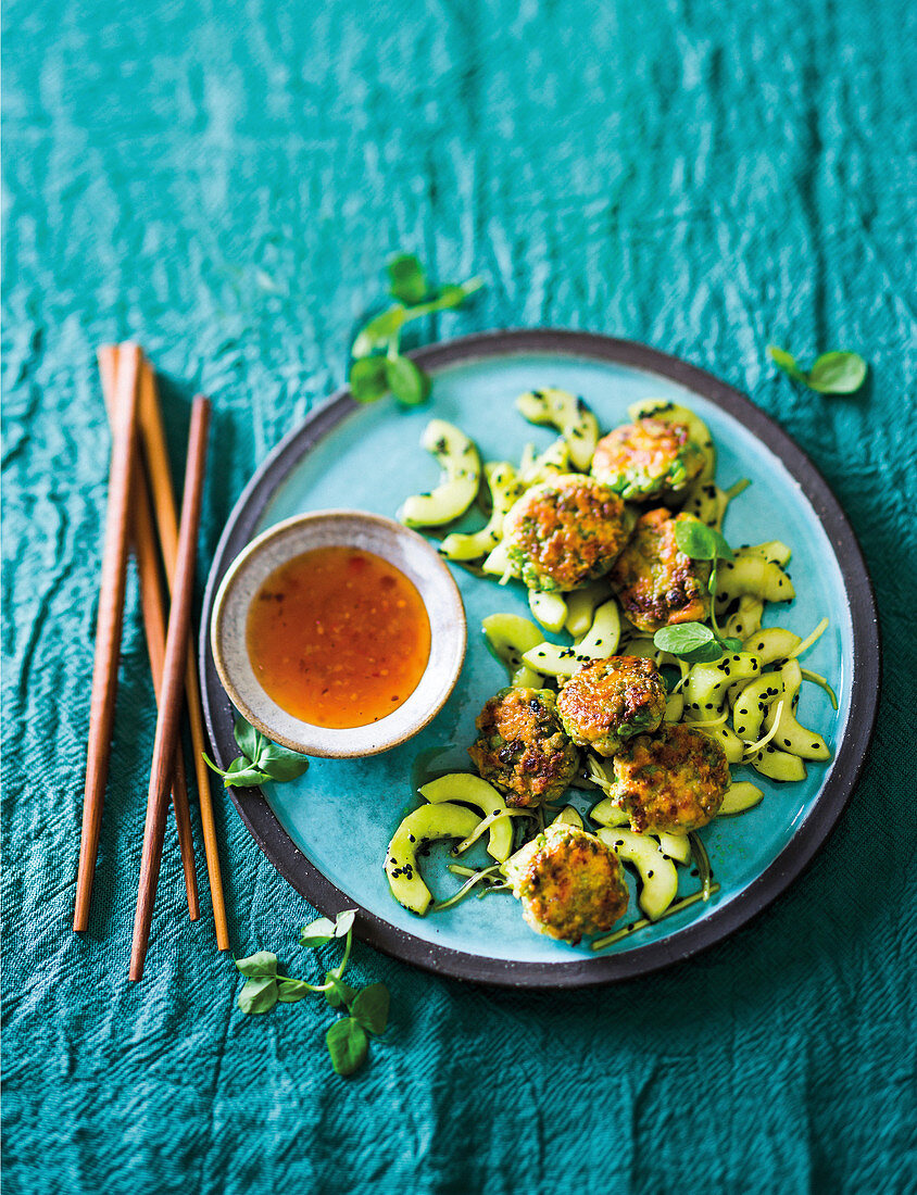 Salmon and pea fishcakes with cucumber stir-fry