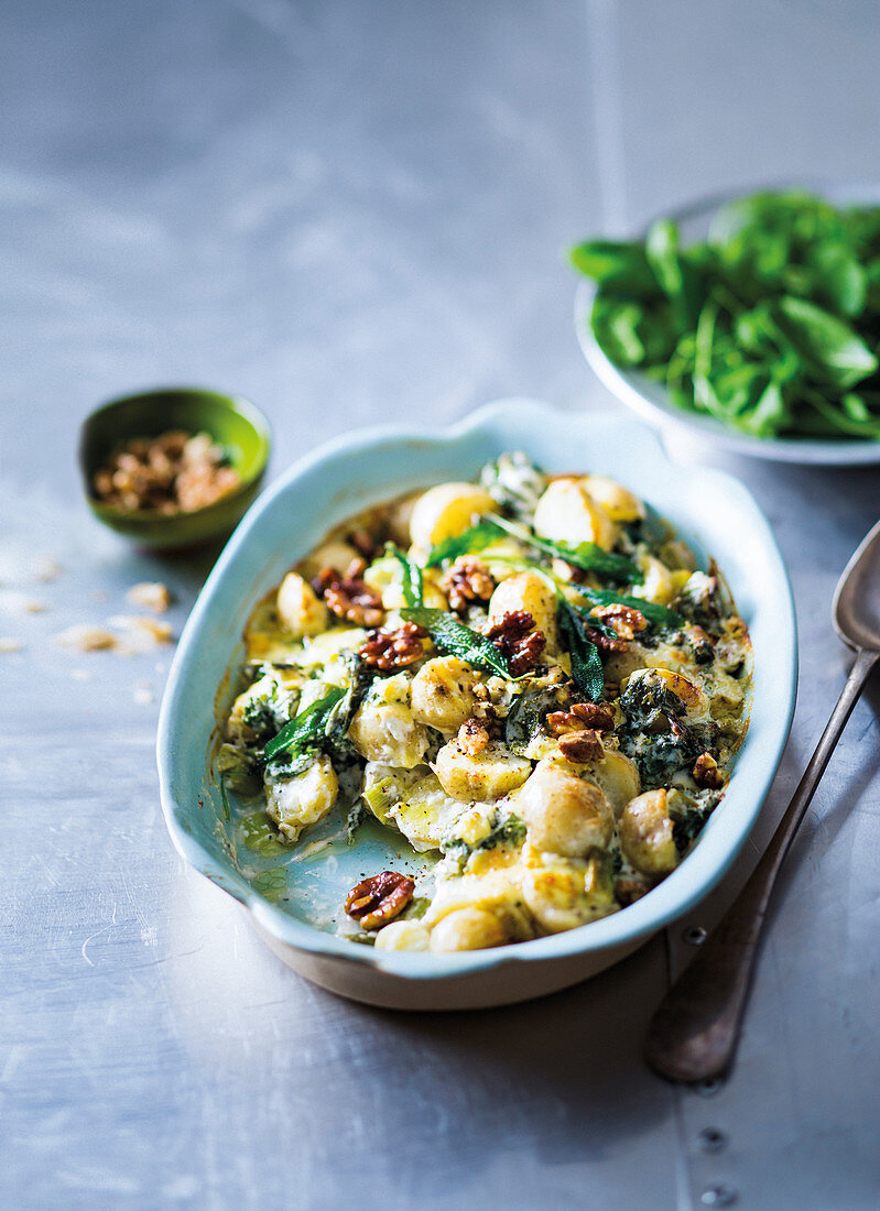 Potato, kale and blue cheese gratin with walnuts