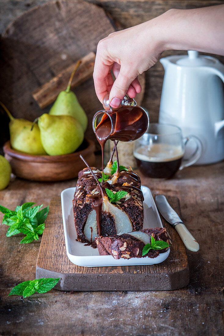Chocolate and almond cake with poached pears