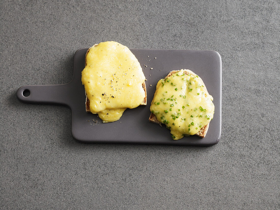 A mini cheese slice duo made in a raclette