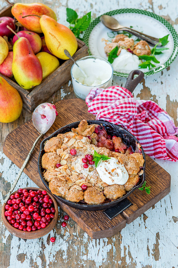 Pear and apple cobbler with cranberries