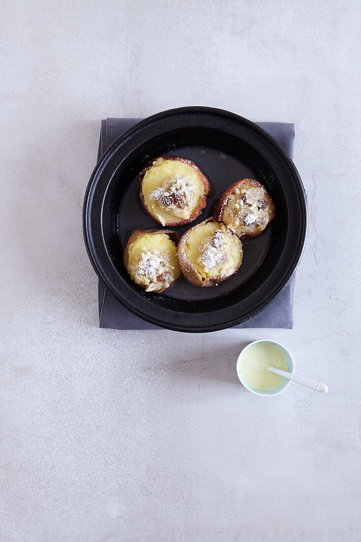 Marzipan baked apples made in a tagine