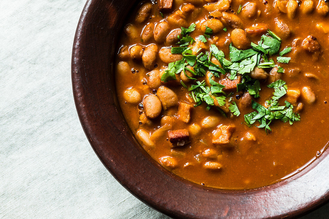 Campfire bean stew with bacon