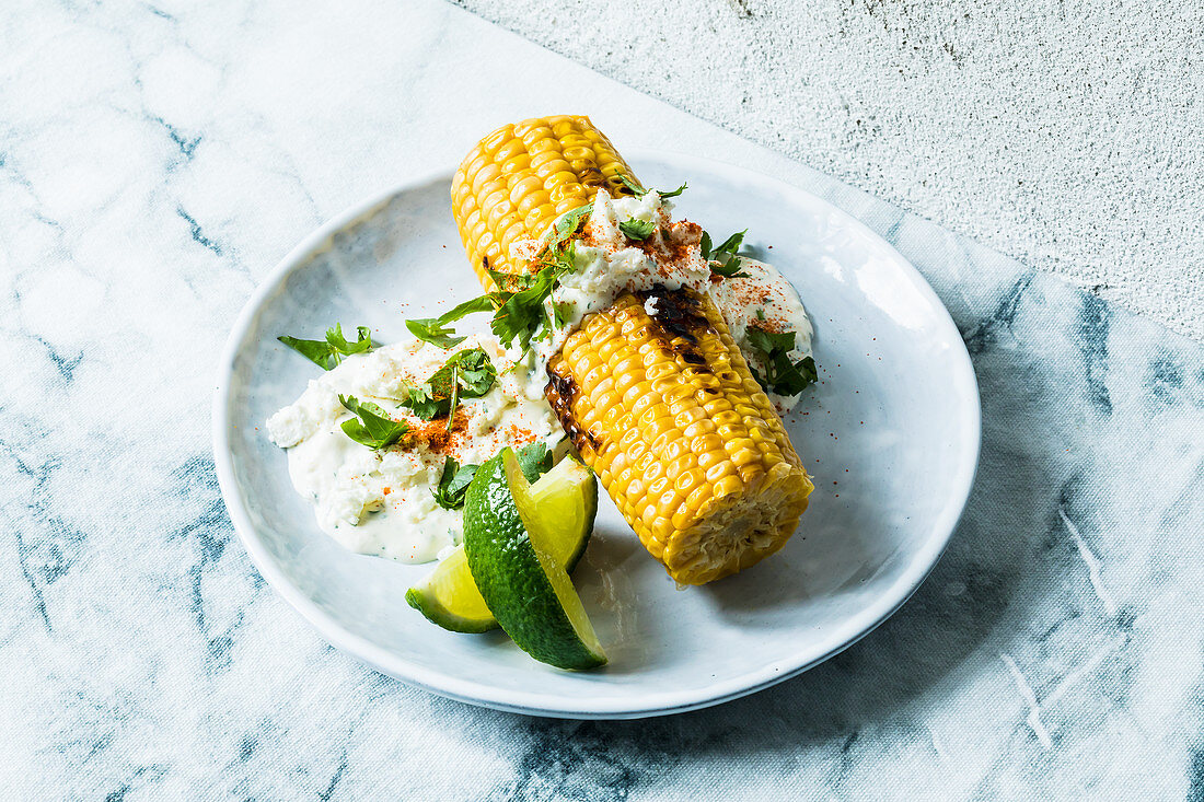 Grilled corn cobs with cream cheese