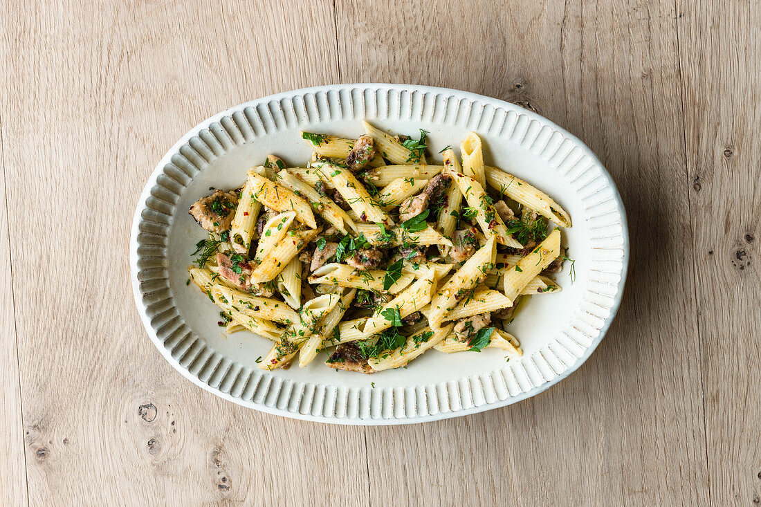Penne with a herb and sardine sauce