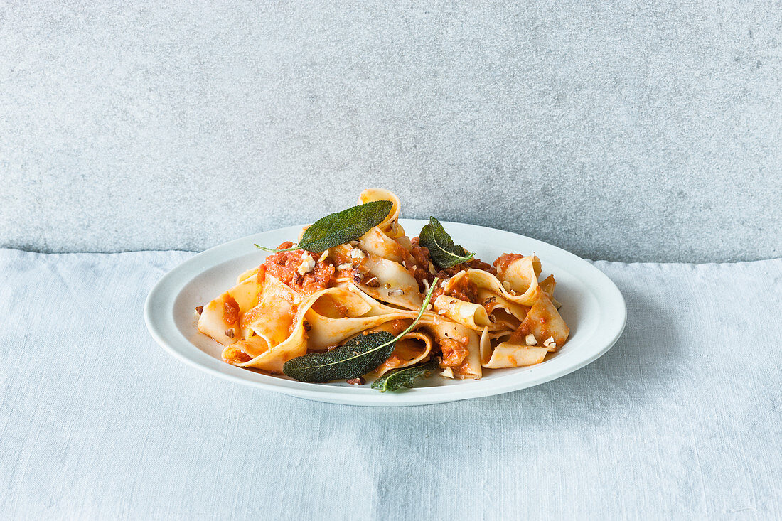 Pappardelle with a fruity, creamy tomato sauce and nuts