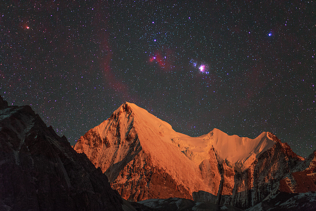 Orion stars and nebulae over Chana Dorje mountain