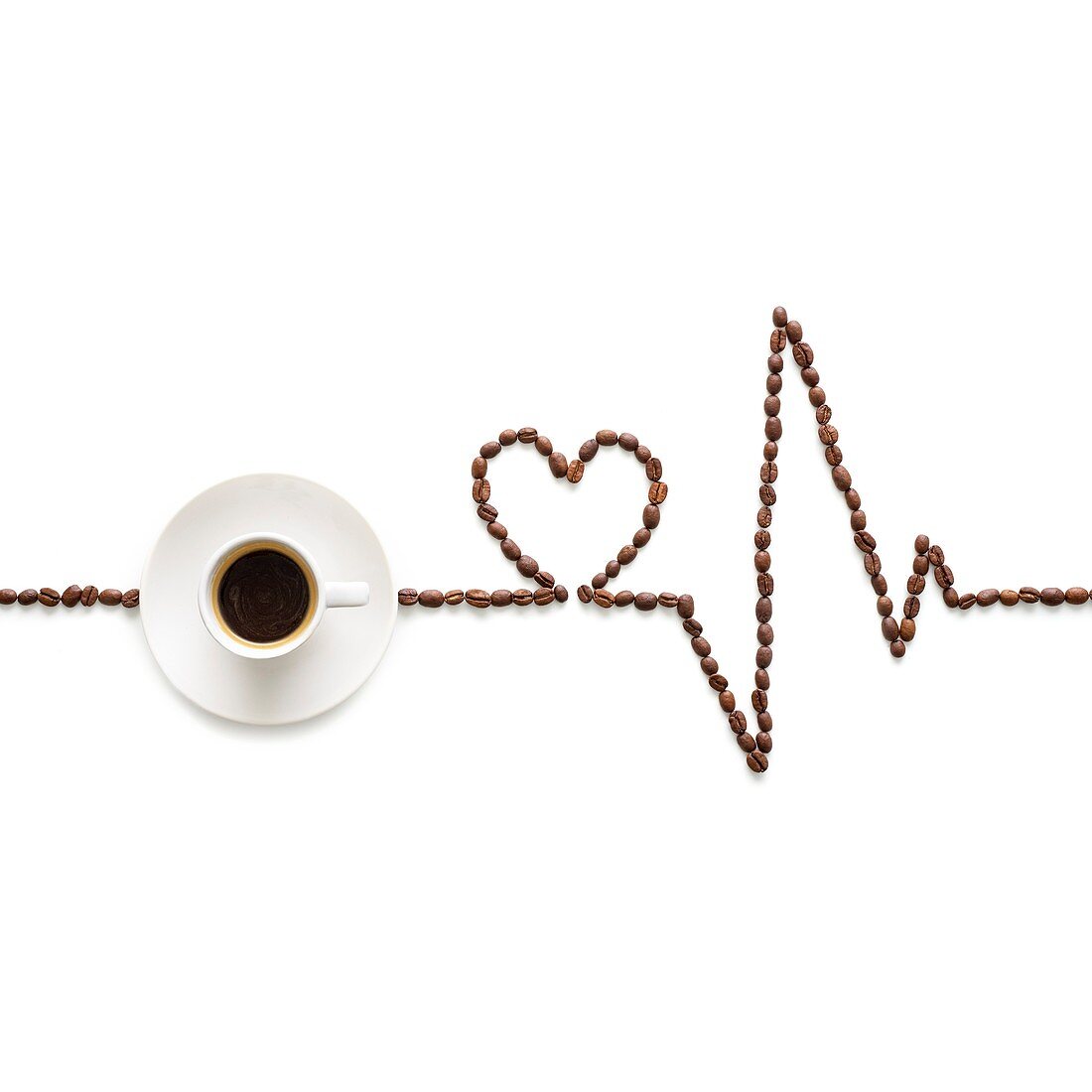 Coffee beans making an electrocardiogram line and heart shap