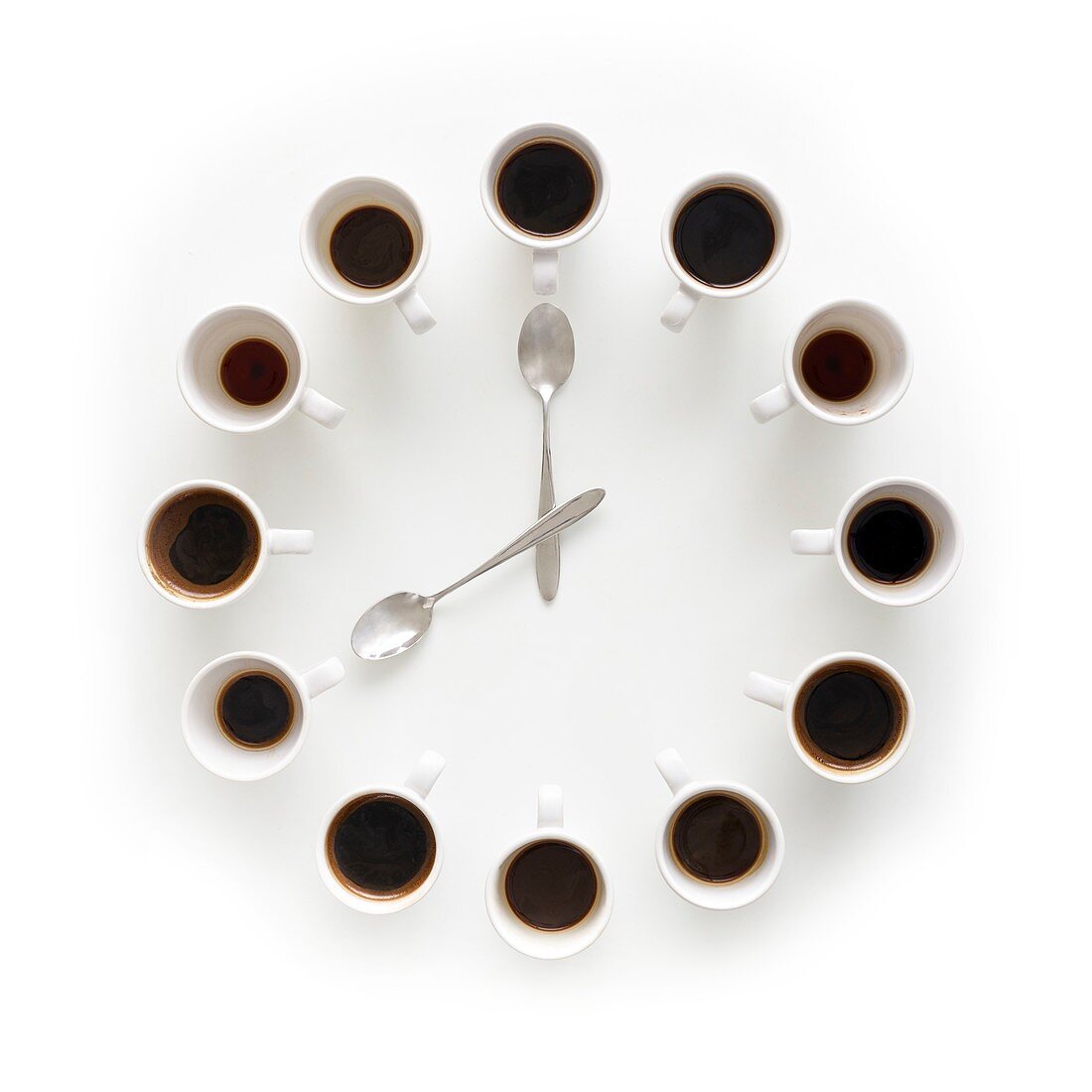 Cups of coffee making the shape of a clock