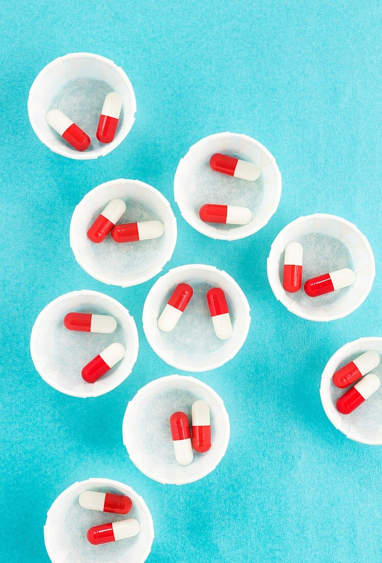 Drug capsules in paper medicine pots