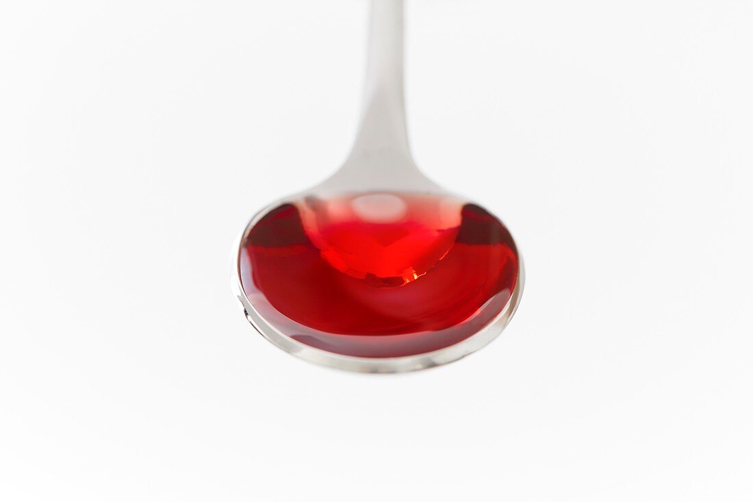 Cough syrup on a spoon